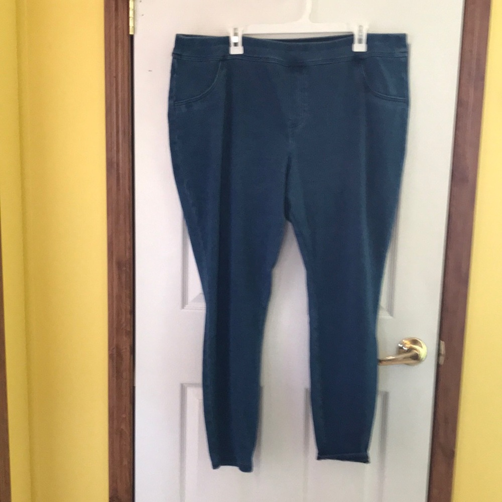 Light wash elastic waistband blue jeans. Only worn once. Very soft and comfy.
